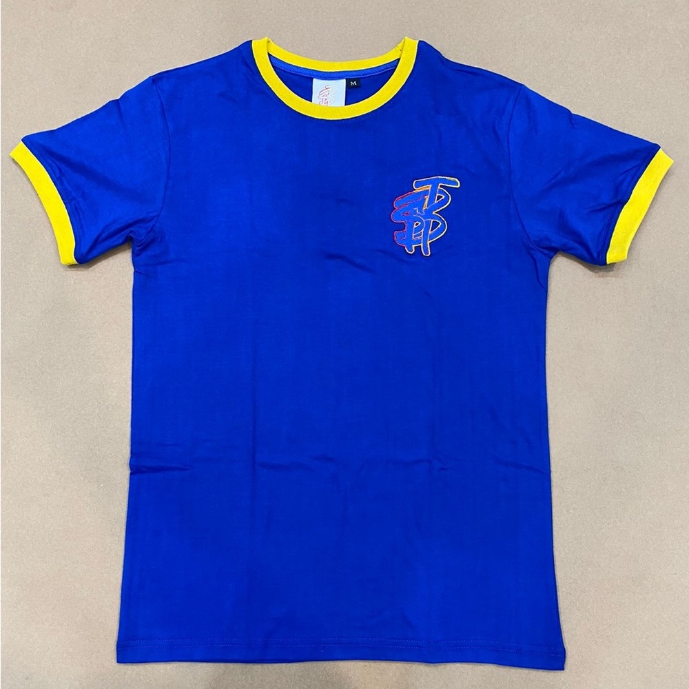 STUCK BETWEEN THE 90s UNISEX SHORT SLEEVE TSHIRT ROYAL BLUE AND YELLOW.